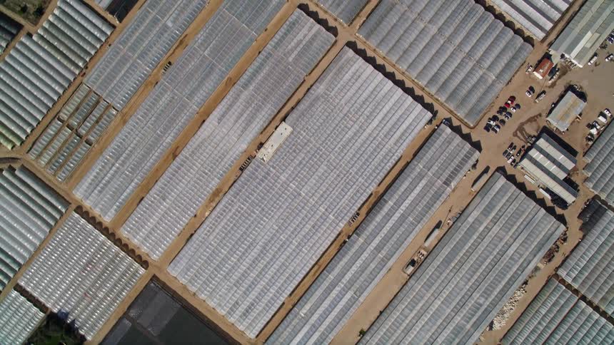 Aerial view of a large storage and warehouse facility on a rural area
