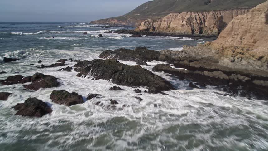 Aerial panorama of the sea under the coast during the day