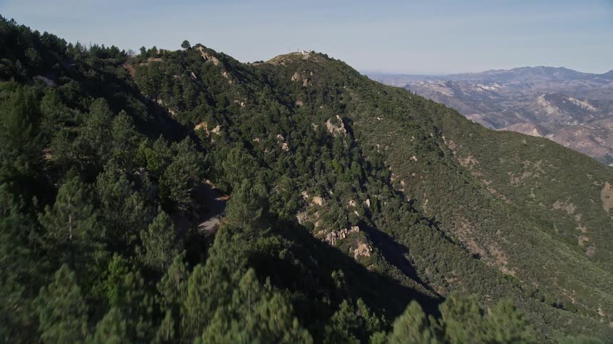 An aerial clip of a mountainous forest