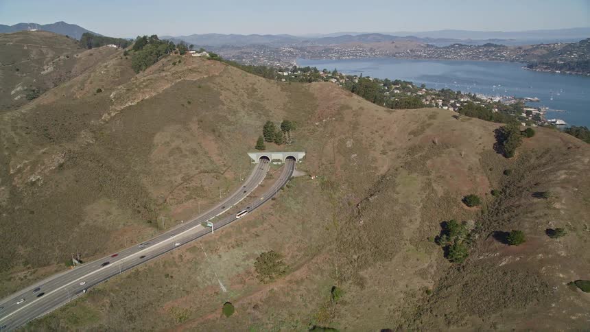 An aerial clip of a highway and tunneling system