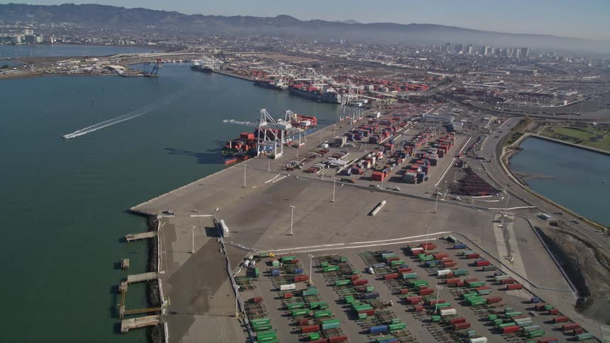 Aerial panorama of a waterfront port at a distribution center