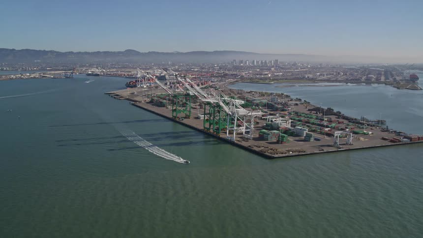 Aerial panorama of a logistics distribution center at a seaside port