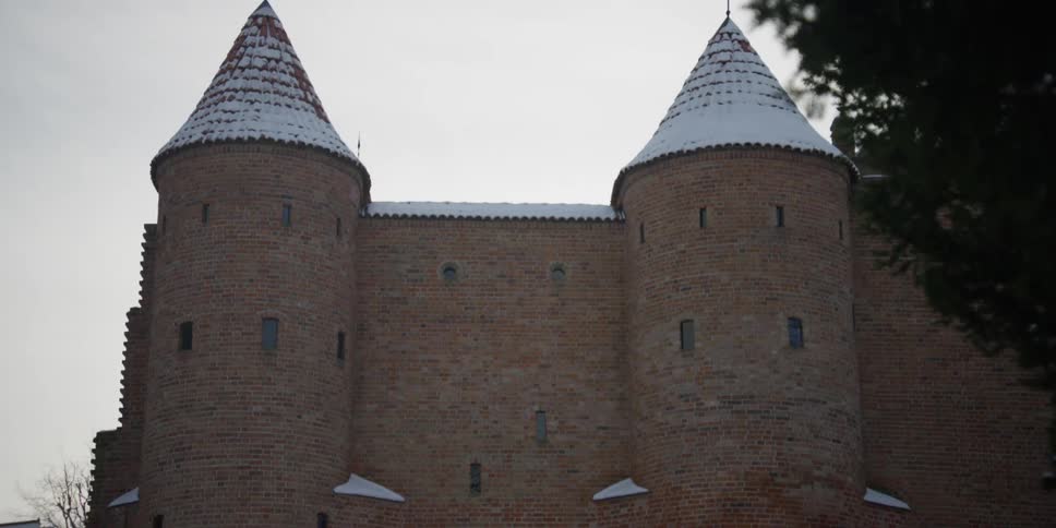 Upward scanning view of the Warsaw Barbican Castle in Poland