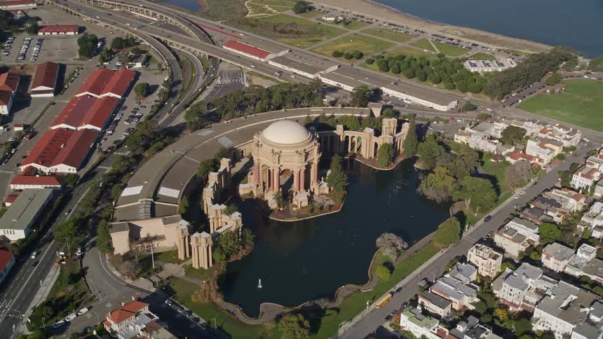 Aerial panorama of the palace of fine arts in front of a residential neighborhood and the seafront