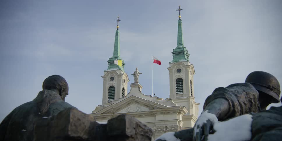 Sculptures of WWII Warsaw resistance fighters in front of the Field Cathedral of the Polish Army