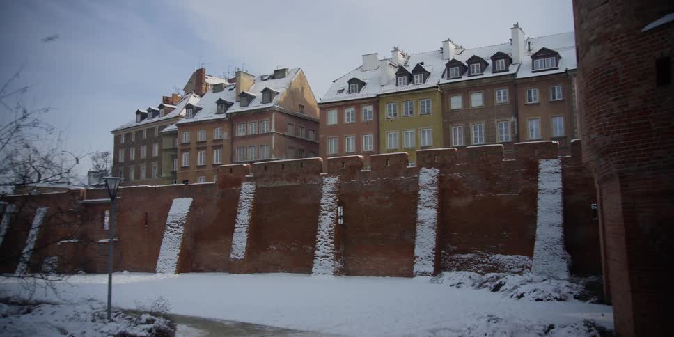 View of Old Town residential buildings from inside the Warsaw Barbican walls, Poland