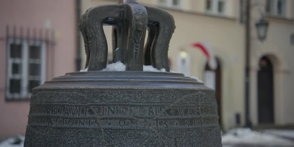 Close up of the Wishing Bell of Warsaw on Kanonia Ulica in Cannon Square