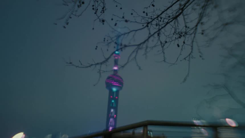 Pearl of the orient tower in shanghai illuminated at night in a metropolis