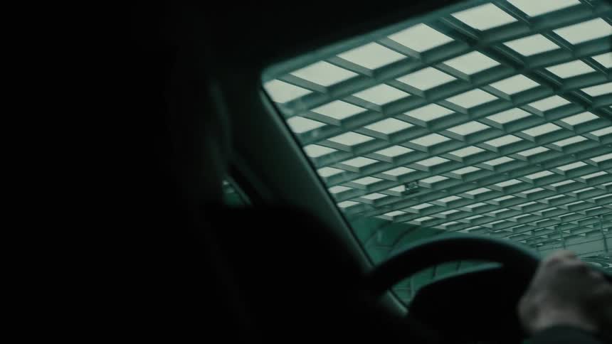 A person is driving through a tunnel