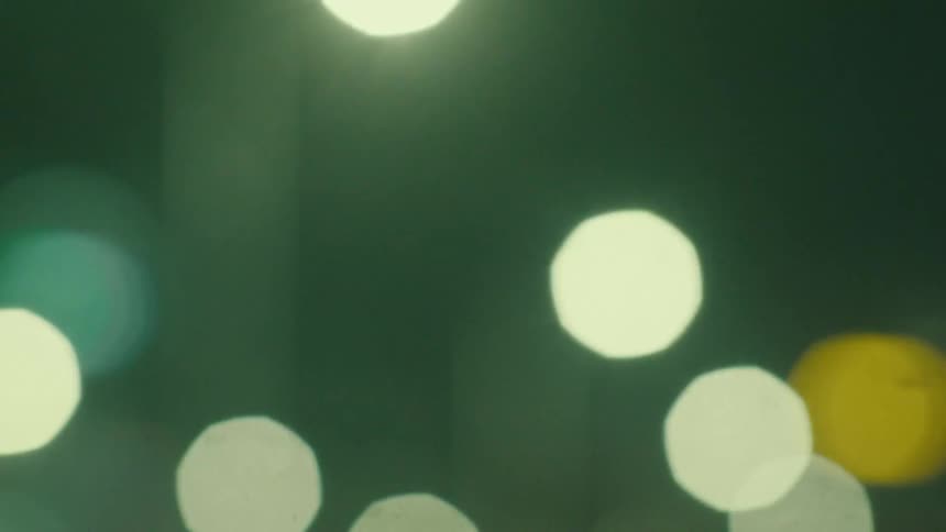 Focus of blurry lights of a metropolis at night