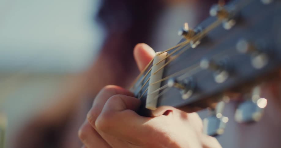 A person playing guitar