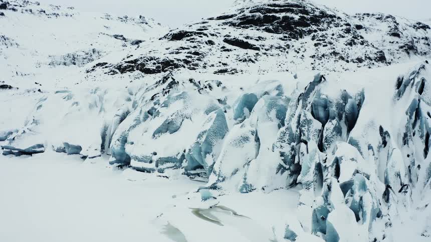 Aerial scenery of snowcovered arctic mountains