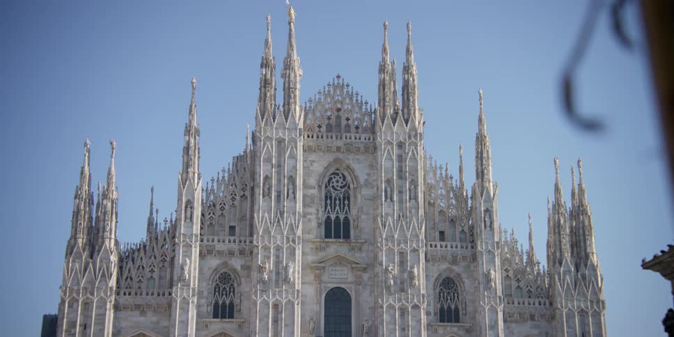 People admiring the Cathedral Duomo di Milano in Milan, Italy