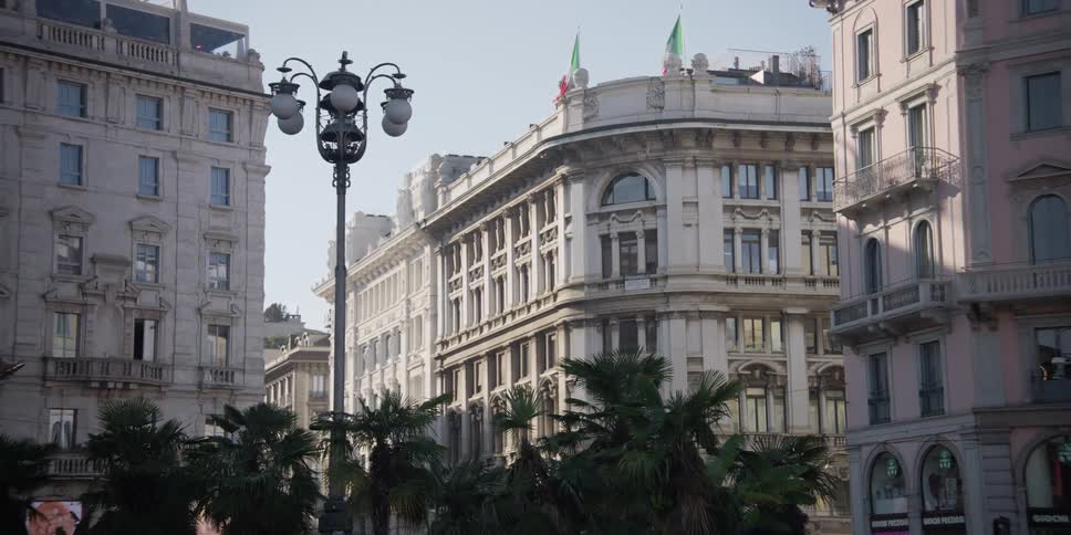 Urban and commercial buildings in Milan, Italy on a blue sky day