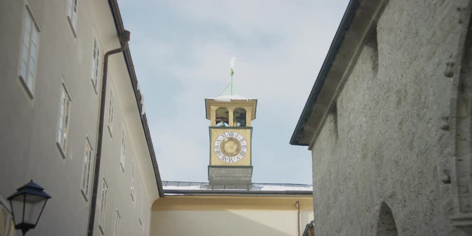 A Clock Tower Above Franziskanergasse Arch in Salzburg, Austria