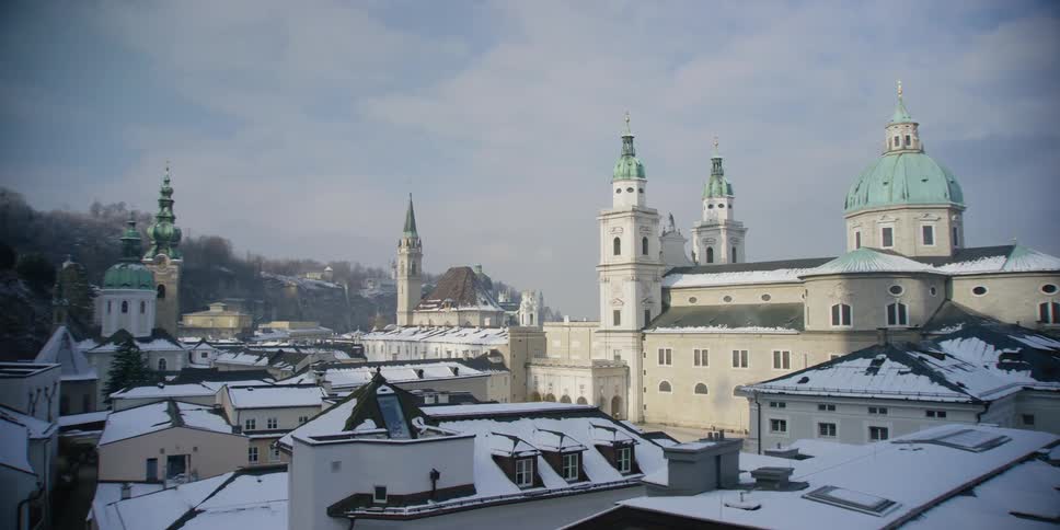 Panoramic view over the snowy rooftops of Salzburg, Austria