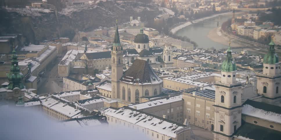 An aerial clip of Salzburg, Austria in winter