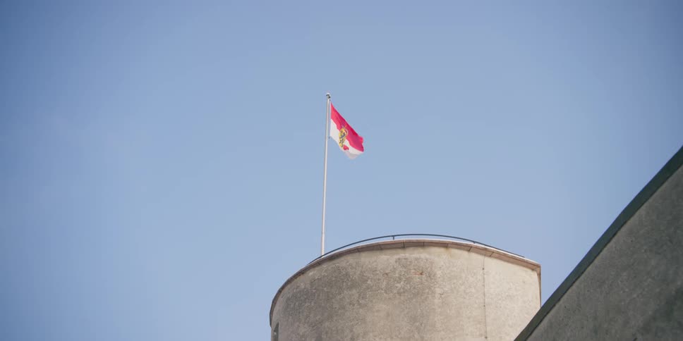 Flag on top of Hohensalzburg Fortress, Salzburg, Austria