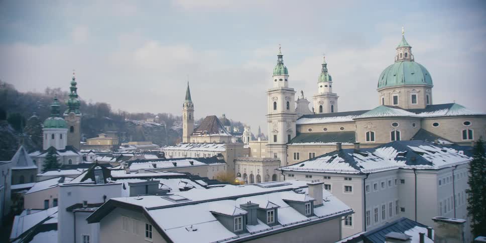 Cathedral domes and spires over Salzburg, Austria in winter