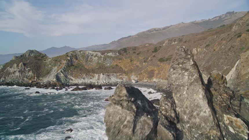 A coastline gives way to a coastal highway
