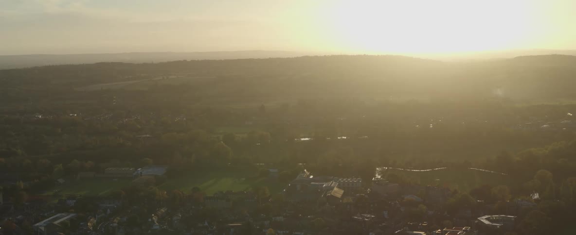 The sun is rising on the town