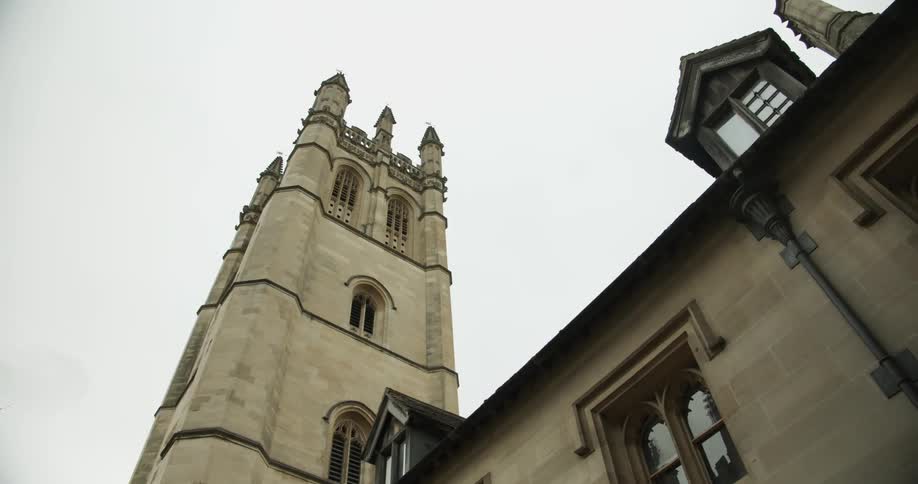 Upward view of mine with the tower of a cathedral with ancient structure
