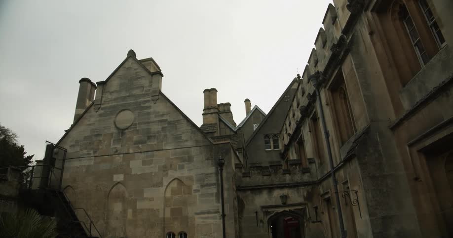 Exterior architecture of a medieval residential neighborhood on a cloudy day