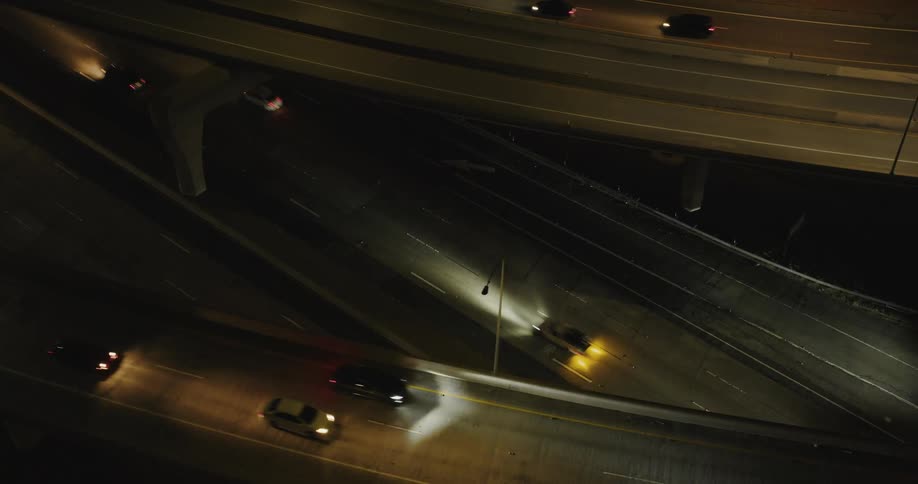Traffic flows on the freeway at night