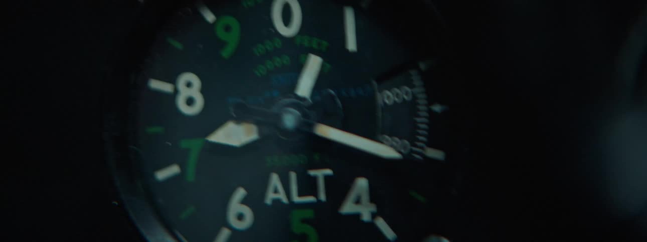 Shaky close up of an airplane altimeter