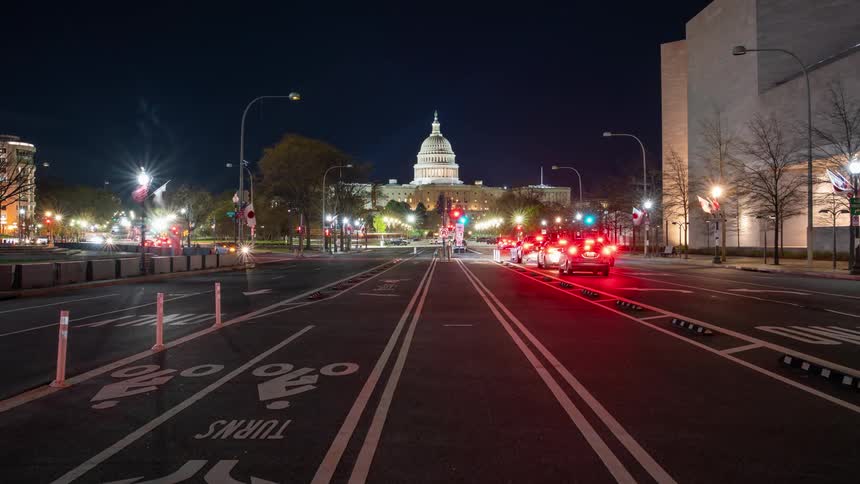 Time lapse of traffic in front of the us capitol building at night
