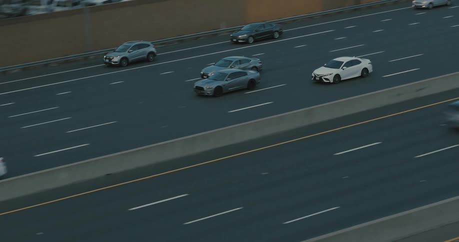 Panorama of an urban suburban city with highways with vehicle traffic