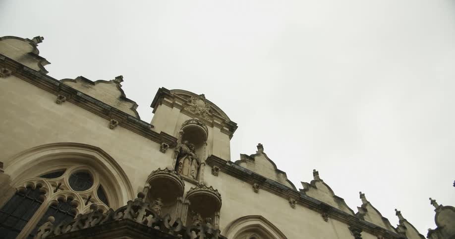 Exterior architecture of an ancient cathedral on a cloudy day