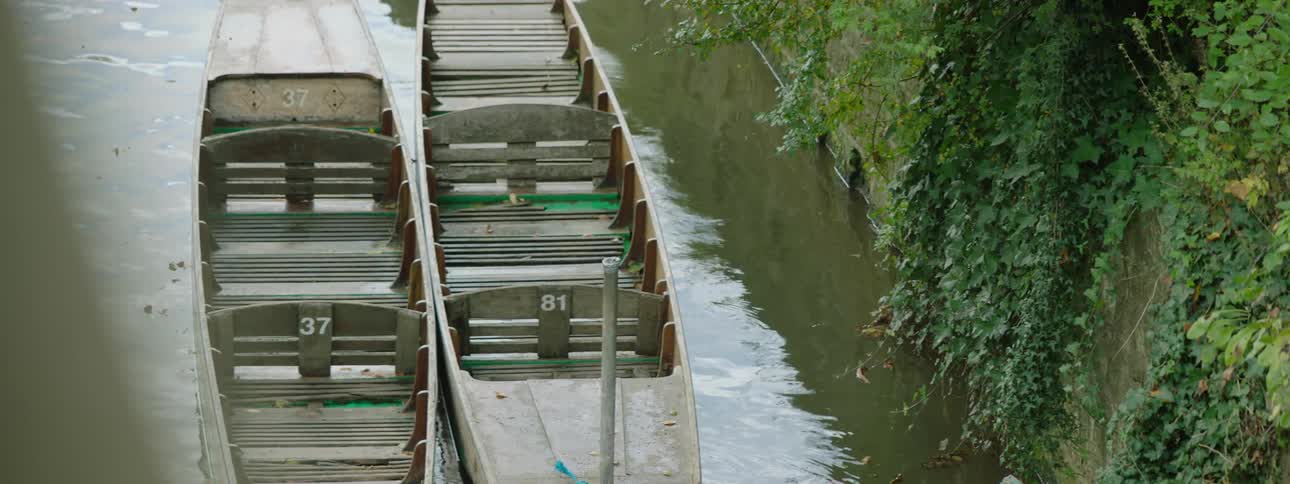 Two boats floating in a canal