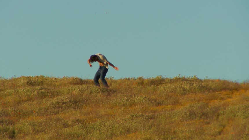 A clip of a person dancing outdoor