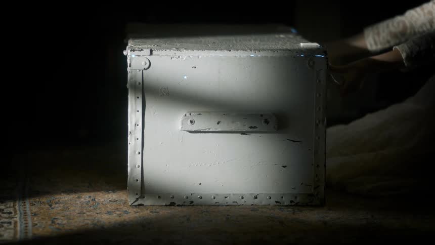A clip of a box in a dark room