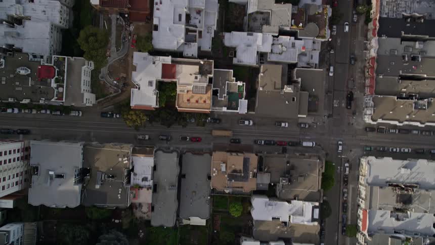 The city is full of buildings and cars