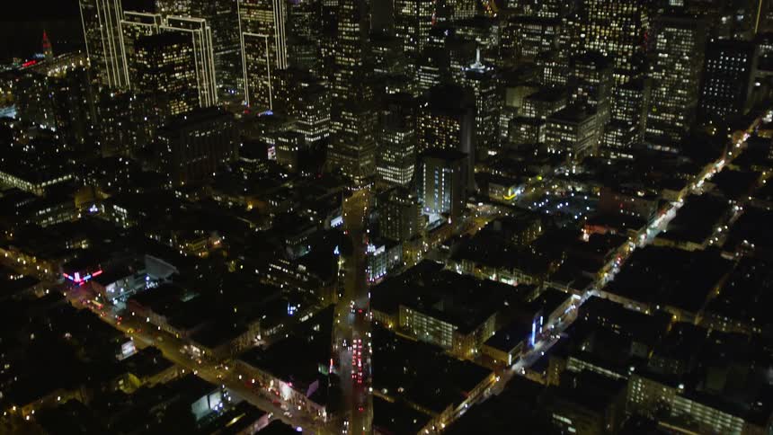 The city is brightly lit at night