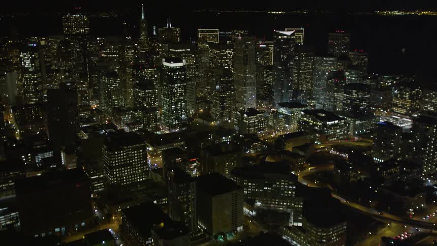 The city is brightly lit at night