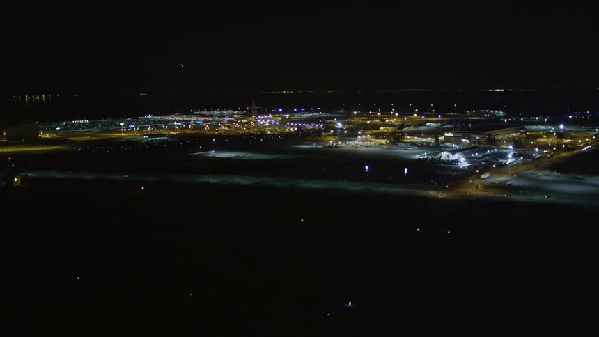 An airport sits near a city