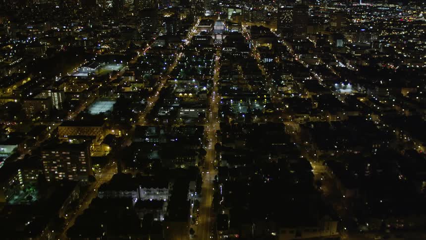 Traffic runs through the city at night