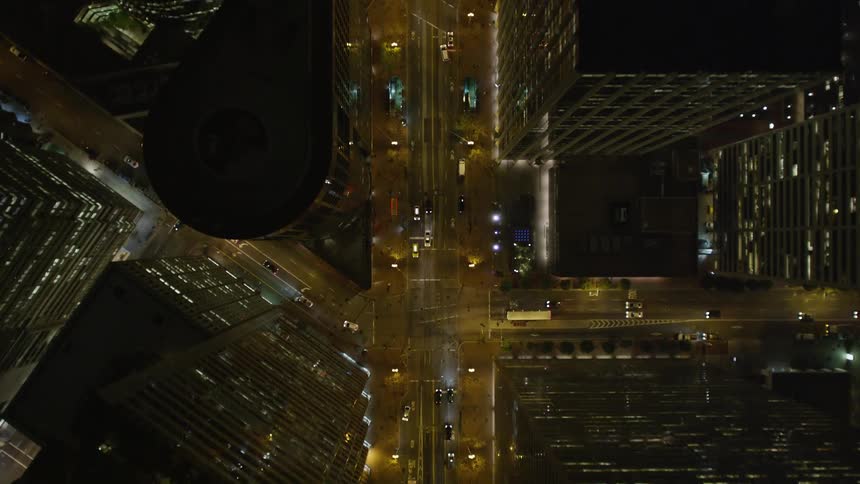 An aerial view of city streets at night