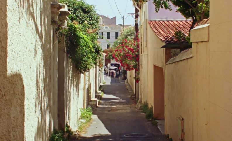 An alley in a city on a sunny day