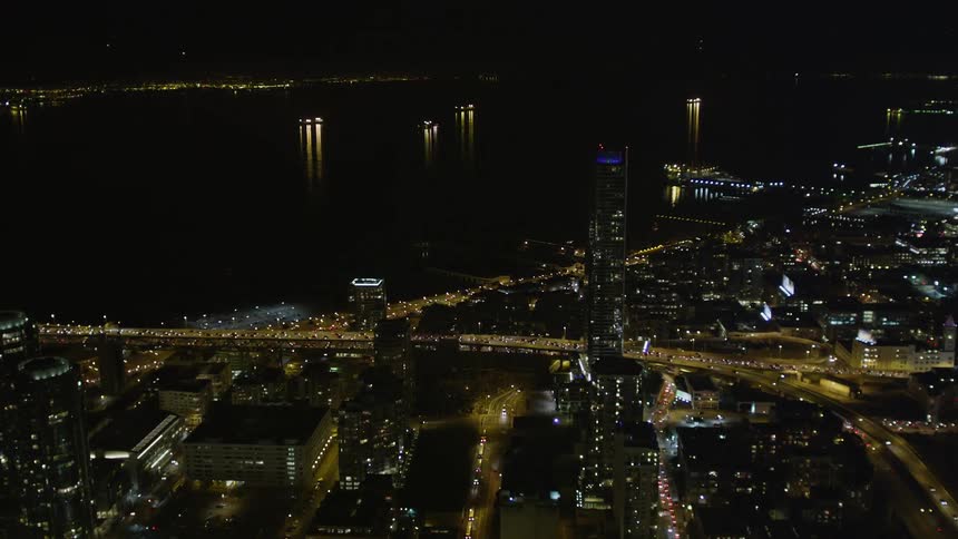 Aerial scenery of a metropolis with skyscraper by the sea