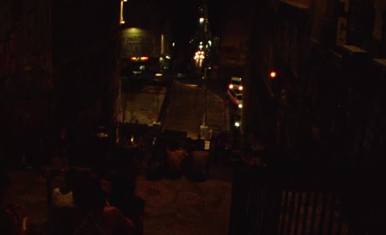The alley in the city is dark