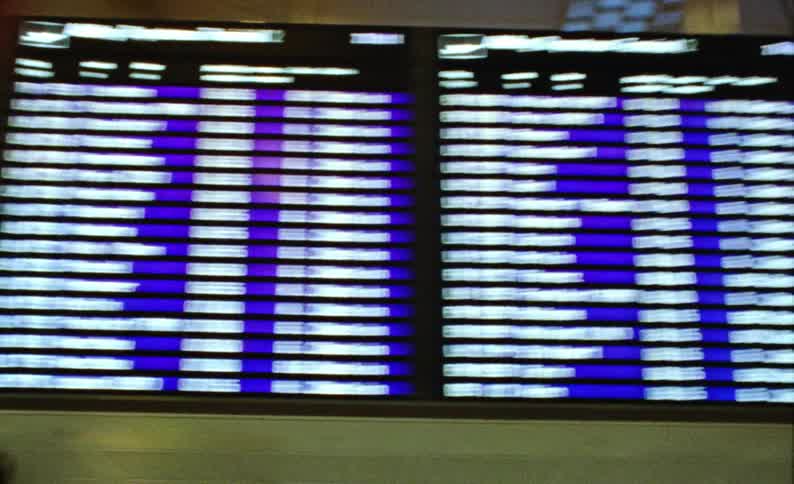 A huge screen with white texts and a black and blue background that is updating every moment