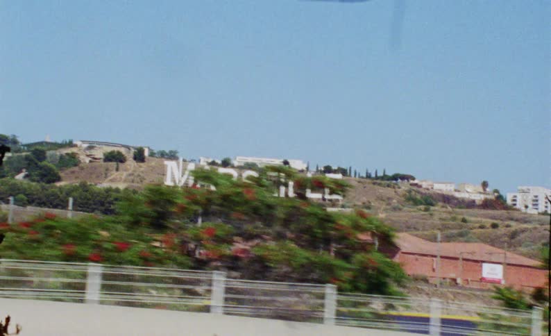 Marseille sign on a mountain on a cloudless blue sky day