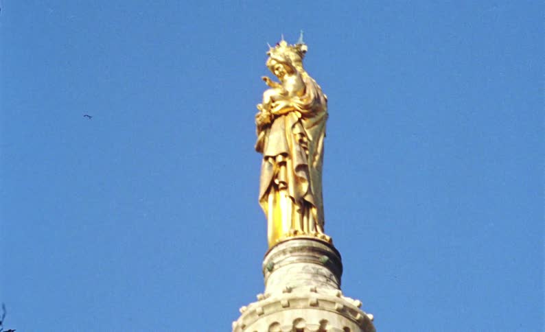The church has a statue at the top
