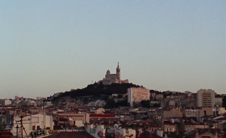 A castle is on a hill near the city