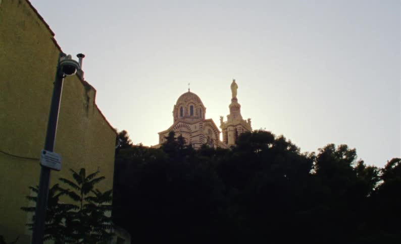 Exterior architecture of a church with tower with monument and a dome