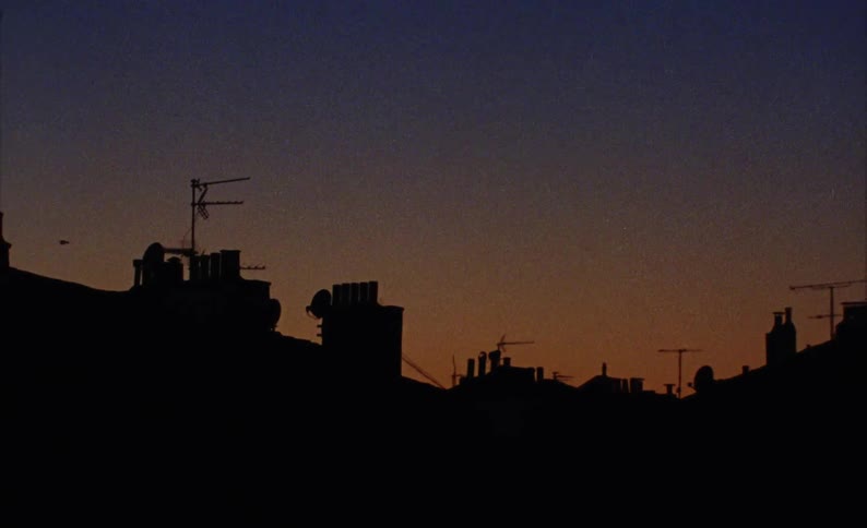 Silhouette of rooftops in the city at sunset